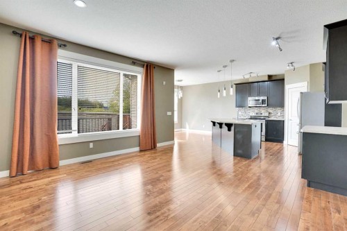 157 Rainbow Falls Boulevard, Chestermere, AB - Indoor Photo Showing Kitchen With Upgraded Kitchen