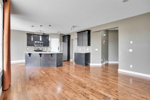 157 Rainbow Falls Boulevard, Chestermere, AB - Indoor Photo Showing Kitchen With Upgraded Kitchen