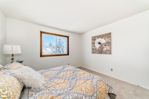 20 Cedardale Hill Sw, Calgary, AB - Indoor Photo Showing Bedroom