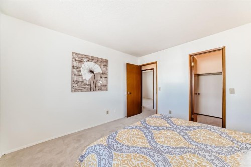 20 Cedardale Hill Sw, Calgary, AB - Indoor Photo Showing Bedroom