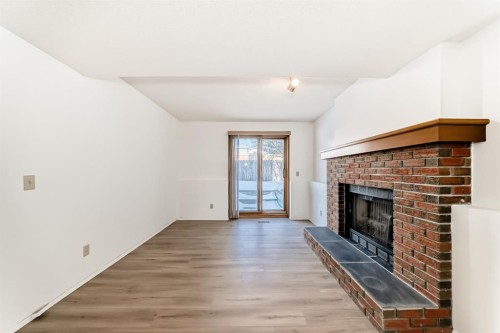 20 Cedardale Hill Sw, Calgary, AB - Indoor With Fireplace