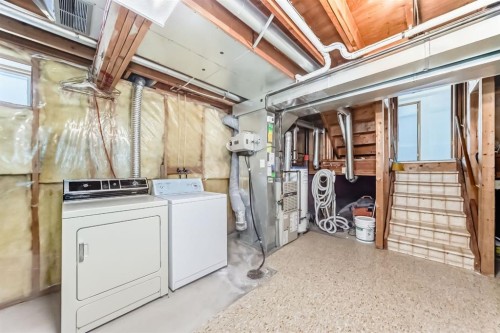 20 Cedardale Hill Sw, Calgary, AB - Indoor Photo Showing Laundry Room