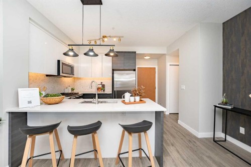 3122-95 Burma Star Road Sw, Calgary, AB - Indoor Photo Showing Kitchen With Stainless Steel Kitchen With Upgraded Kitchen