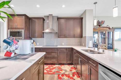 304 Corner Meadows Manor Ne, Calgary, AB - Indoor Photo Showing Kitchen With Double Sink
