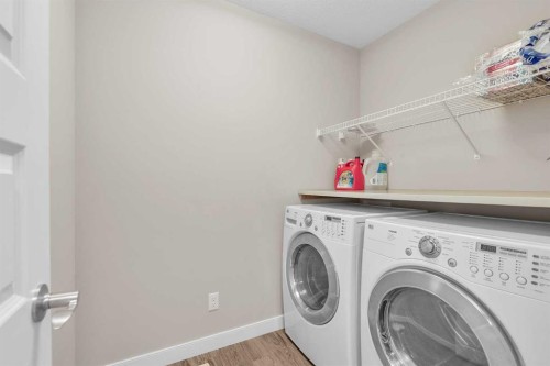 304 Corner Meadows Manor Ne, Calgary, AB - Indoor Photo Showing Laundry Room
