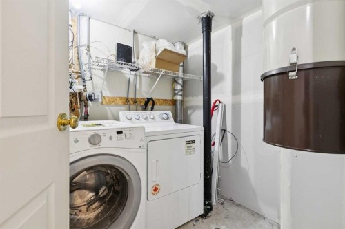 99 Inverness Park Se, Calgary, AB - Indoor Photo Showing Laundry Room