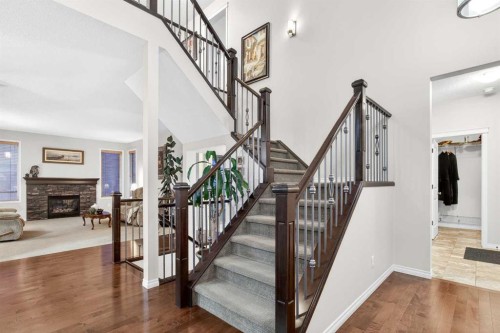 43 Ranchers Crescent, Okotoks, AB - Indoor Photo Showing Other Room With Fireplace