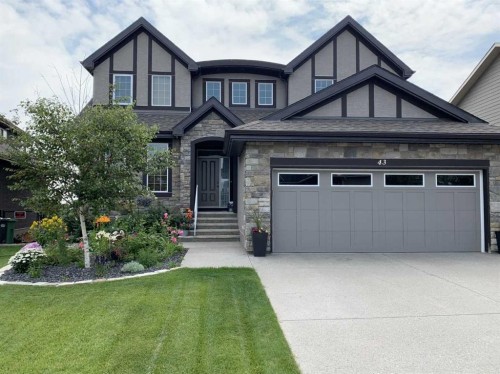 43 Ranchers Crescent, Okotoks, AB - Outdoor With Facade