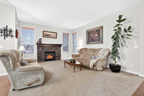 43 Ranchers Crescent, Okotoks, AB - Indoor Photo Showing Living Room With Fireplace
