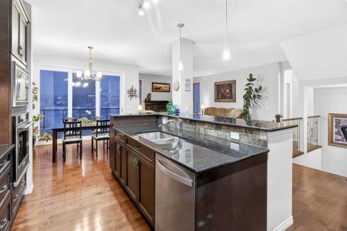 43 Ranchers Crescent, Okotoks, AB - Indoor Photo Showing Kitchen With Double Sink With Upgraded Kitchen