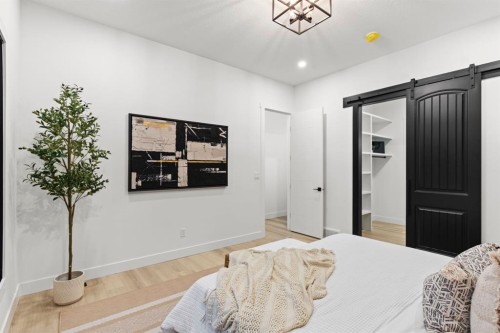 27 Glacier Drive Sw, Calgary, AB - Indoor Photo Showing Bedroom