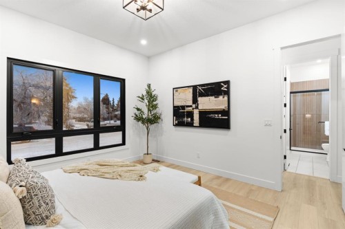 27 Glacier Drive Sw, Calgary, AB - Indoor Photo Showing Bedroom