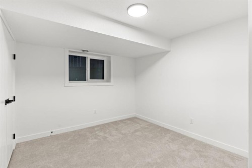 27 Glacier Drive Sw, Calgary, AB - Indoor Photo Showing Other Room