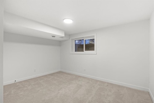 27 Glacier Drive Sw, Calgary, AB - Indoor Photo Showing Other Room