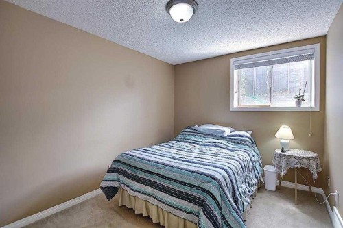 1 Prestwick Mount Se, Calgary, AB - Indoor Photo Showing Bedroom
