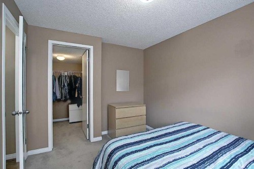 1 Prestwick Mount Se, Calgary, AB - Indoor Photo Showing Bedroom