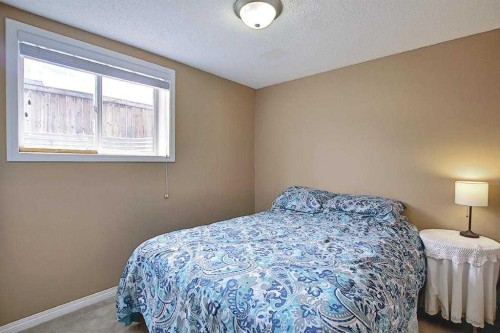 1 Prestwick Mount Se, Calgary, AB - Indoor Photo Showing Bedroom