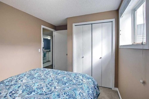 1 Prestwick Mount Se, Calgary, AB - Indoor Photo Showing Bedroom