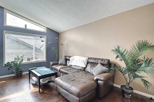1 Prestwick Mount Se, Calgary, AB - Indoor Photo Showing Living Room