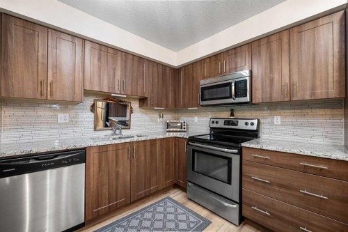 2107-99 Copperstone Park Se, Calgary, AB - Indoor Photo Showing Kitchen With Stainless Steel Kitchen