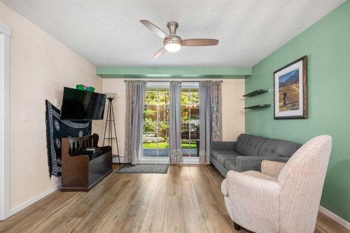 2107-99 Copperstone Park Se, Calgary, AB - Indoor Photo Showing Living Room