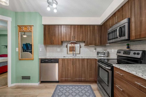 2107-99 Copperstone Park Se, Calgary, AB - Indoor Photo Showing Kitchen With Stainless Steel Kitchen