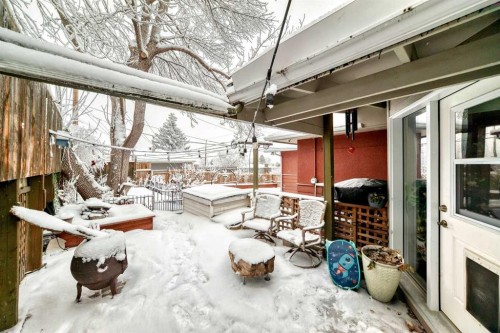 5923 Thorncliffe Drive Nw, Calgary, AB - Outdoor With Fireplace With Deck Patio Veranda