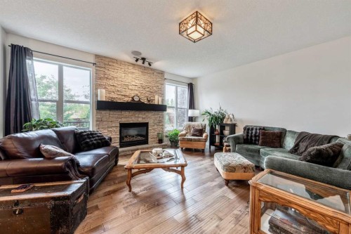 101 Rockford Road Nw, Calgary, AB - Indoor Photo Showing Living Room With Fireplace