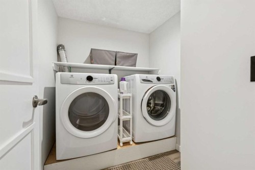 36 Riverview Drive, Cochrane, AB - Indoor Photo Showing Laundry Room