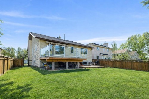 36 Riverview Drive, Cochrane, AB - Outdoor With Deck Patio Veranda With Backyard With Exterior