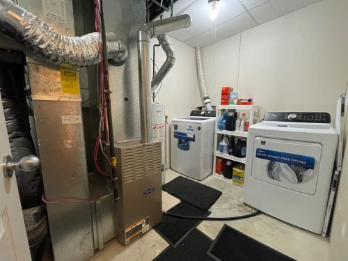 63 Glensummit Close, Cochrane, AB - Indoor Photo Showing Laundry Room