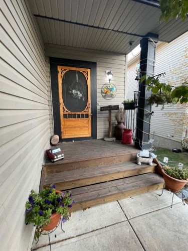 63 Glensummit Close, Cochrane, AB - Outdoor With Deck Patio Veranda With Exterior