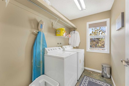 291 Mckerrell Way Se, Calgary, AB - Indoor Photo Showing Laundry Room