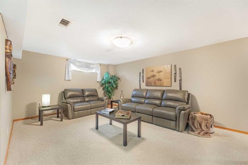 291 Mckerrell Way Se, Calgary, AB - Indoor Photo Showing Living Room