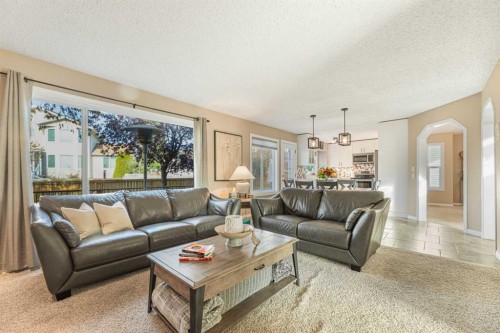 291 Mckerrell Way Se, Calgary, AB - Indoor Photo Showing Living Room