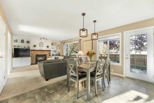 291 Mckerrell Way Se, Calgary, AB - Indoor With Fireplace