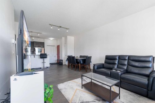 2205-175 Silverado Boulevard Sw, Calgary, AB - Indoor Photo Showing Living Room