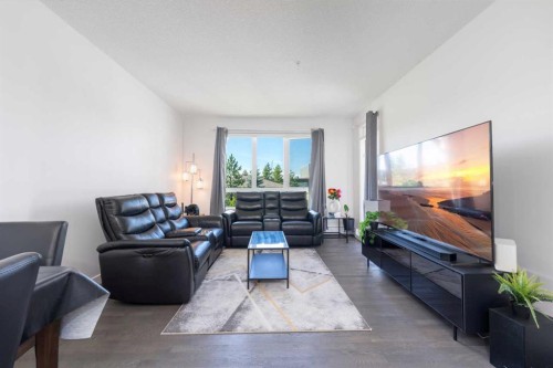 2205-175 Silverado Boulevard Sw, Calgary, AB - Indoor Photo Showing Living Room