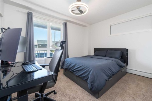 2205-175 Silverado Boulevard Sw, Calgary, AB - Indoor Photo Showing Bedroom