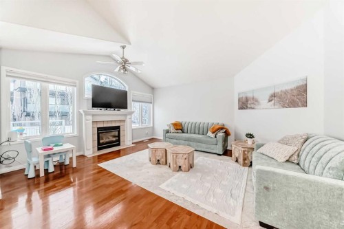 3263 Signal Hill Drive Sw, Calgary, AB - Indoor Photo Showing Living Room With Fireplace