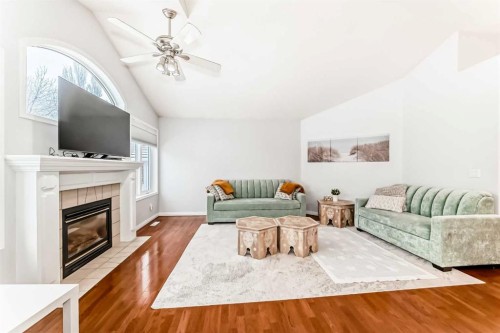 3263 Signal Hill Drive Sw, Calgary, AB - Indoor Photo Showing Living Room With Fireplace