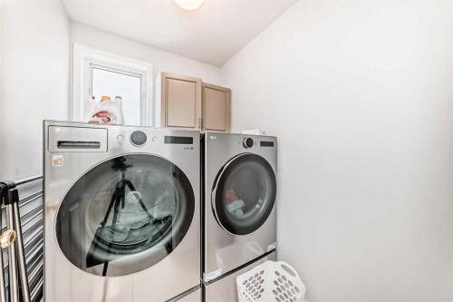 3263 Signal Hill Drive Sw, Calgary, AB - Indoor Photo Showing Laundry Room