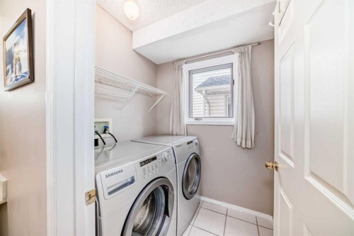 1405 Shawnee Road Sw, Calgary, AB - Indoor Photo Showing Laundry Room