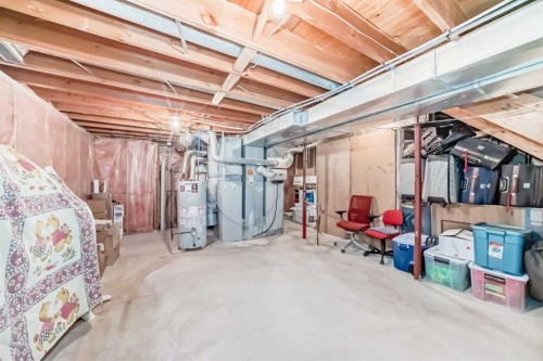 1405 Shawnee Road Sw, Calgary, AB - Indoor Photo Showing Basement