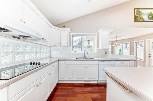 1405 Shawnee Road Sw, Calgary, AB - Indoor Photo Showing Kitchen With Double Sink