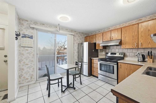 284 Falton Drive Ne, Calgary, AB - Indoor Photo Showing Kitchen With Double Sink