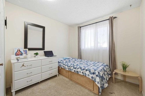 284 Falton Drive Ne, Calgary, AB - Indoor Photo Showing Bedroom