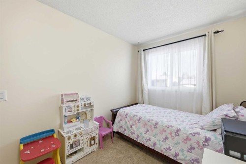 284 Falton Drive Ne, Calgary, AB - Indoor Photo Showing Bedroom