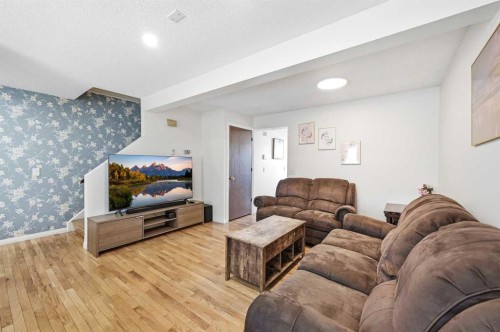 284 Falton Drive Ne, Calgary, AB - Indoor Photo Showing Living Room