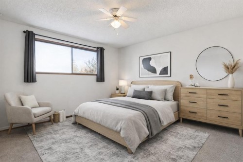 9 Jensen Crescent Ne, Airdrie, AB - Indoor Photo Showing Bedroom